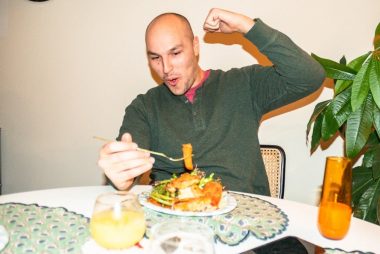 Mike eating a good plate of gluten free food during christmas dinner.
